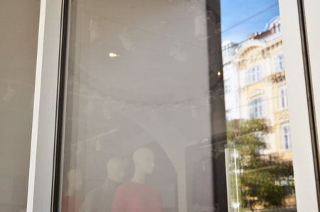Boutique window from outside. Blank glass for logo or text promotion, mockup.の写真素材