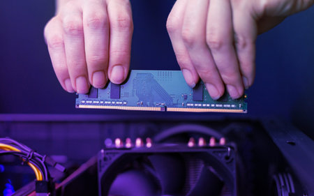 Installing a memory module in your computer. A simple module for a personal computer.