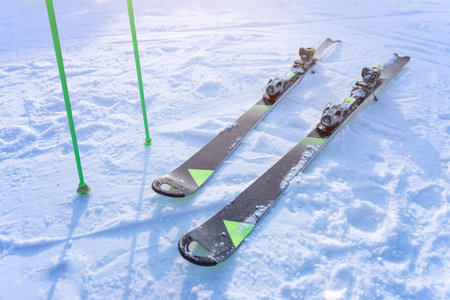 Skis and poles for the race on the slope. The concept of sports and recreational skiing