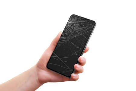 Isolated broken phone in woman handの写真素材