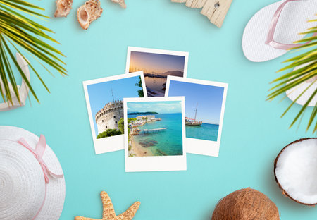 Travel photos surrounded by beach accessories concept. Top view, flat lay compositionの写真素材