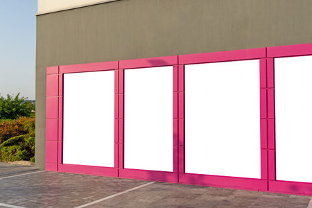 White blank billboard posters in the shop windows for advertisement campaign promotionの写真素材