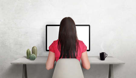 Girl work on computer on work desk. Isolated screen for design promotion mockup. Concept of technology and business. Work from home and at workの写真素材