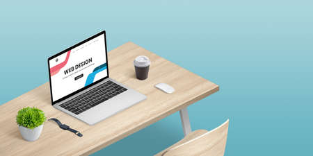 Web design studio concept with laptop computer on desk in isometric position. Copy space besideの写真素材