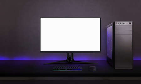Gaming computer with isolated screen for mockup on desk. Modern computer hardware with gaming led lightsの写真素材