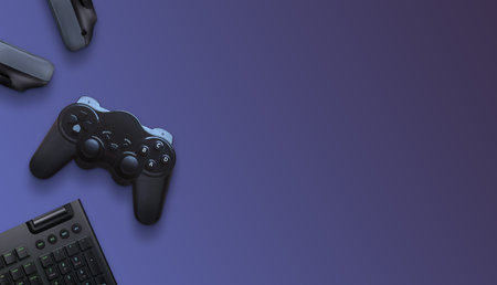 Gaming composition with joypad, keyboard and headphones with copy space on purple surfaceの写真素材