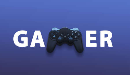 Gamer text with joypad in name. Creative gamer concept on purple surfaceの写真素材