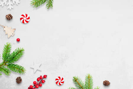 Flat lay Christmas background with little Christmas decorations and copy spaceの写真素材