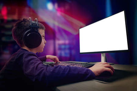Gamer playing game concept. Isolated display screen for game presentation mockup. Led lights in backgroundの写真素材