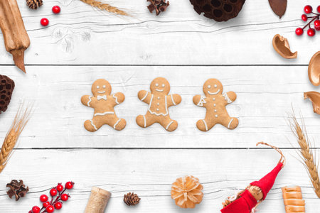 Happy Christmas cookies on a wooden table, surrounded by Christmas decorations. The concept of food...