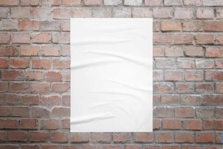 Poster mockup on brick wall with crumpled textureの写真素材