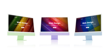 Colorful displays on a desk, showcasing a unique web design studio concept web page. Creativity, digital rendering, and modern web design conceptの写真素材