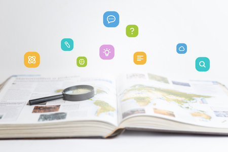 Open book and magnifying glass with floating icons: learning, search, atoms, brain, knowledge, dialogue, question mark. Ideal for education, curiosity, research, knowledge-sharing, and academic visualsの写真素材