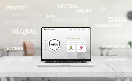 Laptop with VPN dashboard on screen surrounded by floating keywords like encryption, IP, anonymous, server, and secure data in office setup.の写真素材
