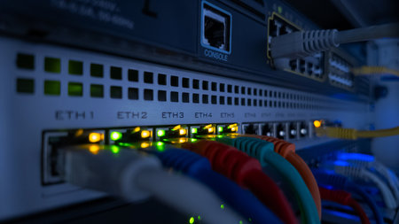 Close-up video of blinking LEDs on network switch showing data flow and connection activity, perfect for IT, technology, and data conceptsの写真素材