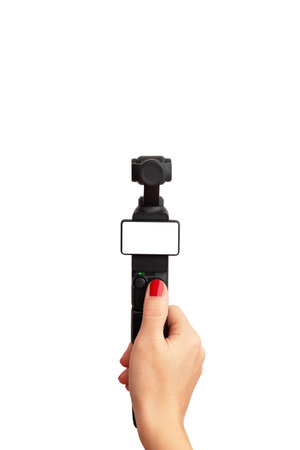 Compact handheld camera for travel or vlog recording on white background, minimalist design ideal for technology, lifestyle or product mockup conceptsの写真素材
