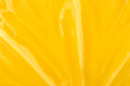 Slice of an orange isolated on a white backgroundの写真素材