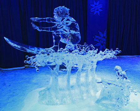 Ice sculpture of surfer, illuminated at night in Confederation Park, Winterlude Event, Ottawaのeditorial素材