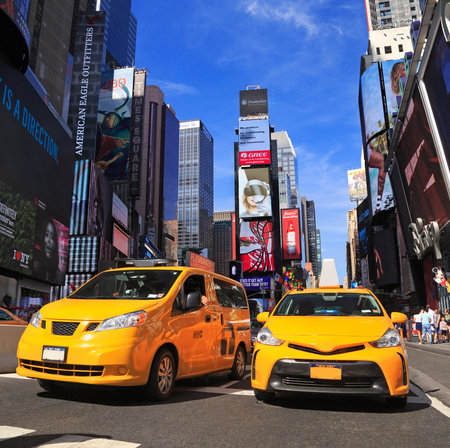 Yellow Taxis in Times Square is a major commercial intersection and neighborhood in Midtown...