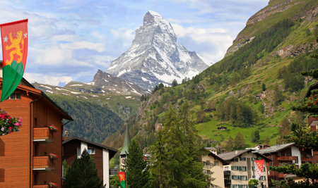 Zermatt hotels, church tower with the Matterhorn on the backgroundのeditorial素材