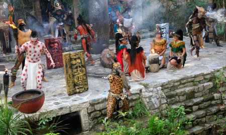 Pre-Hispanic Mayan amerindian people performance into the jungle in the ancient Mayan Village, Riviera Maya, Mexicoのeditorial素材