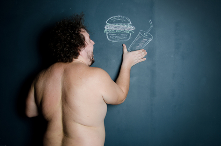 Dreams. Hungry funny man.の写真素材