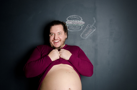 Smile. Dreams. Hungry funny man.の写真素材