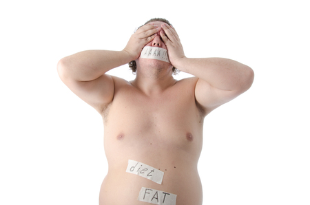 Man with taped mouth on a diet.の写真素材