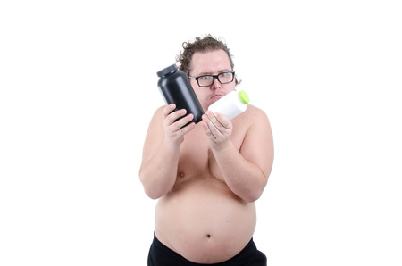 Funny fat guy and sports nutrition.の写真素材