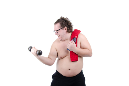 Fat guy in the gym. Fun workout.の写真素材