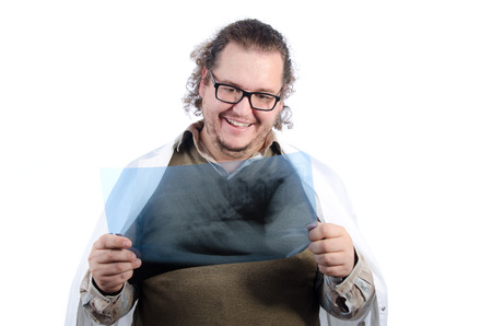 Happy doctor with X-rayの写真素材