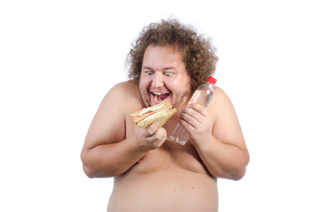 Hungry fat guy with a sandwich.の写真素材