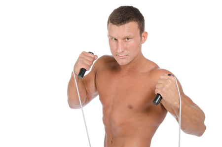 Fitness and healthy lifestyle. Man and training White background.の写真素材