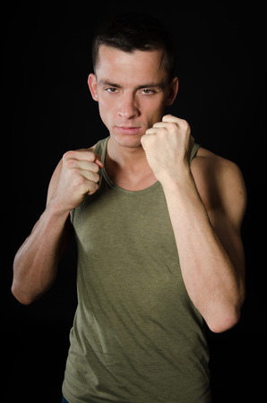 Young handsome man. Fights without rules. Fighterの写真素材