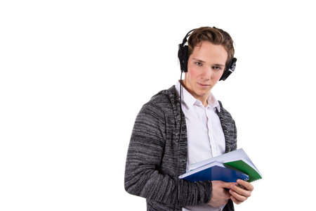 Young attractive student is listening to music.