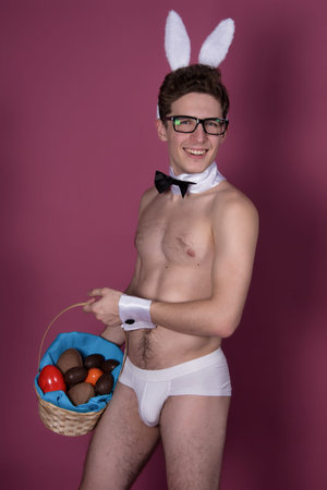 Easter. Two funny young guys. White background. Cute man.