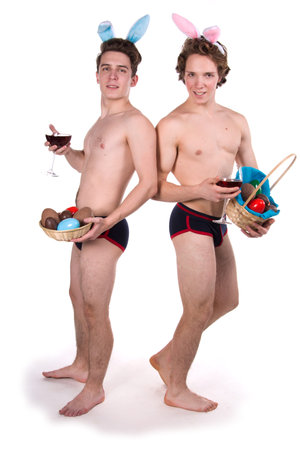 Holidays and weekends. Young attractive couple for Easter in bunny costumes.