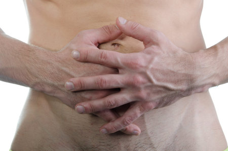 Abdominal pain. Attractive man and health problems.