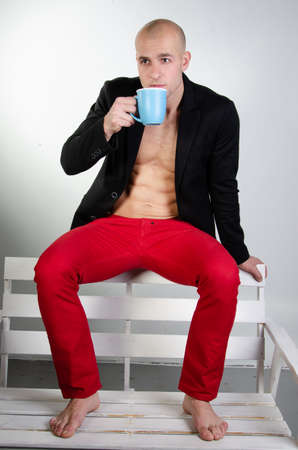 Young attractive guy. Beautiful body.の写真素材