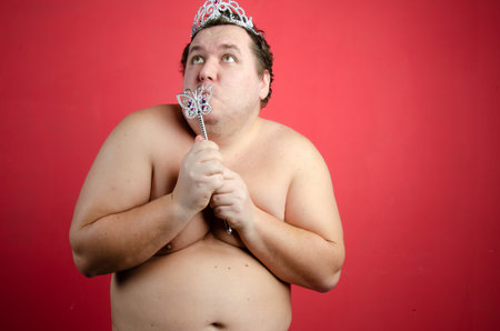 Funny fat man and laptop.の写真素材