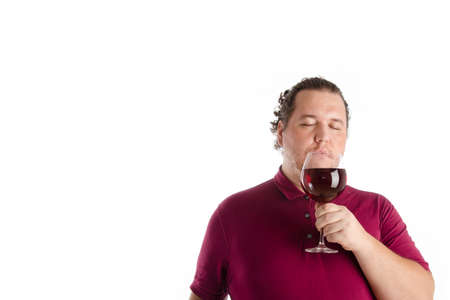 Funny fat guy and wine. White background.の写真素材