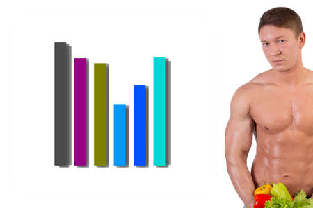 Sport and diet. Attractive man with muscular body. Athletic guy and vegetables. Healthy eatingの写真素材
