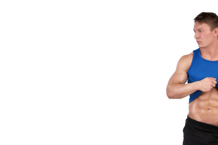 Sport and diet. Attractive man with muscular body. Athletic guy and vegetables. Healthy eating