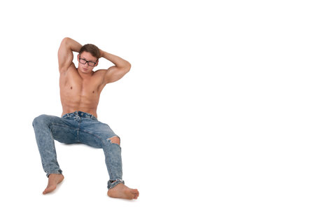 Sport and diet. Attractive man with muscular body. Athletic guy and vegetables. Healthy eatingの写真素材