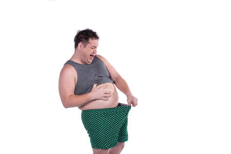 Men's health and funny fat man.の写真素材