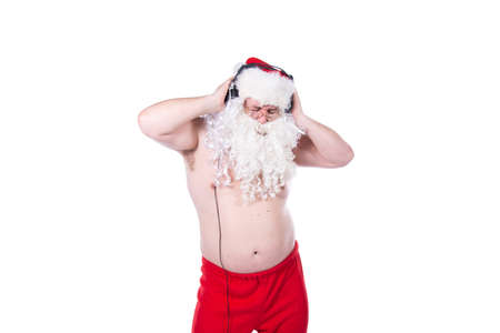 Fitness and healthy lifestyle. Funny Santa Claus.の写真素材