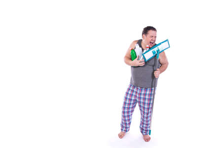 Cleaning and hygiene. Funny fat man with cleaning products.の写真素材