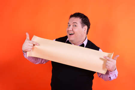 Adult attractive man on a colored background. Business and work.の写真素材