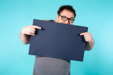 Adult attractive man on a colored background. Business and work.の写真素材