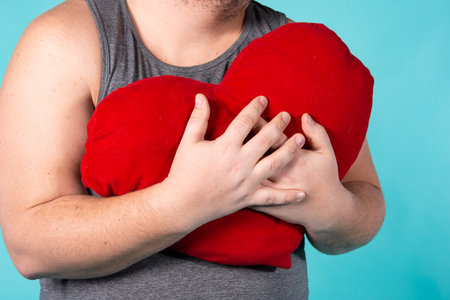 Funny fat man wakes up in the morning.の写真素材